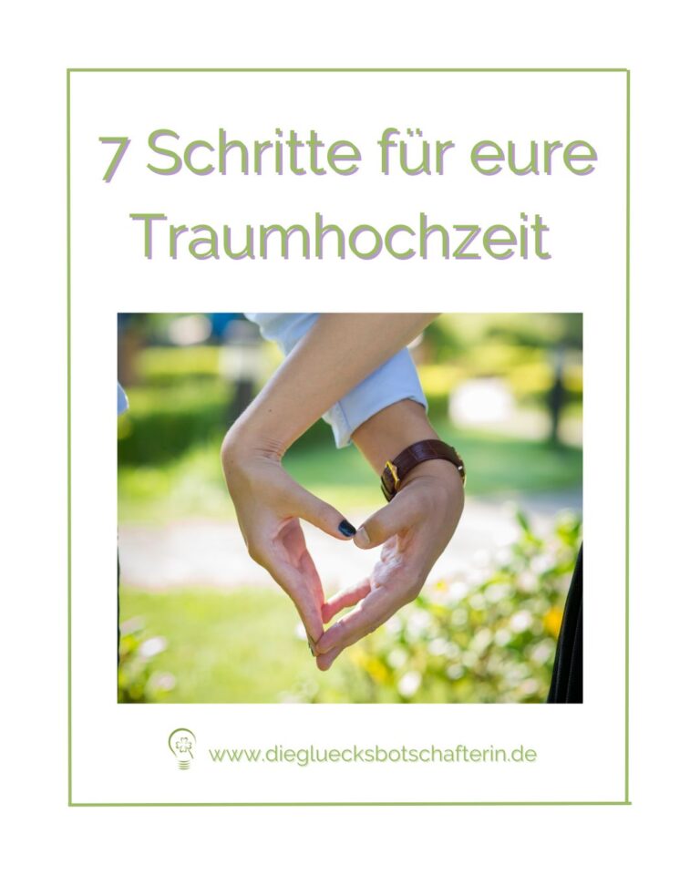 Ein Paar hält die Hände zum Herz geformt, da sie entspannt ihre Traumhochzeit mit meinen 7 Schritten planen.